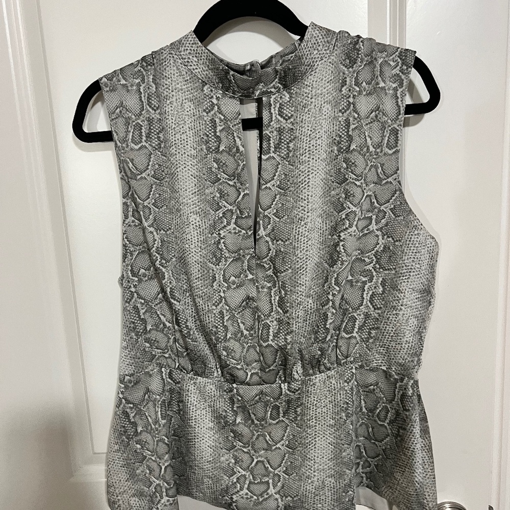 Sexy python print sleeveless blouse from BCBG. NWT. Sz large